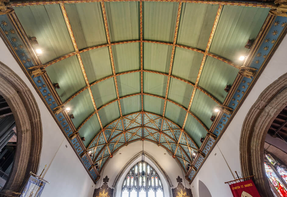 Erco track and spotlights to uplight the Chancel roof in Plympton St Maurice Church